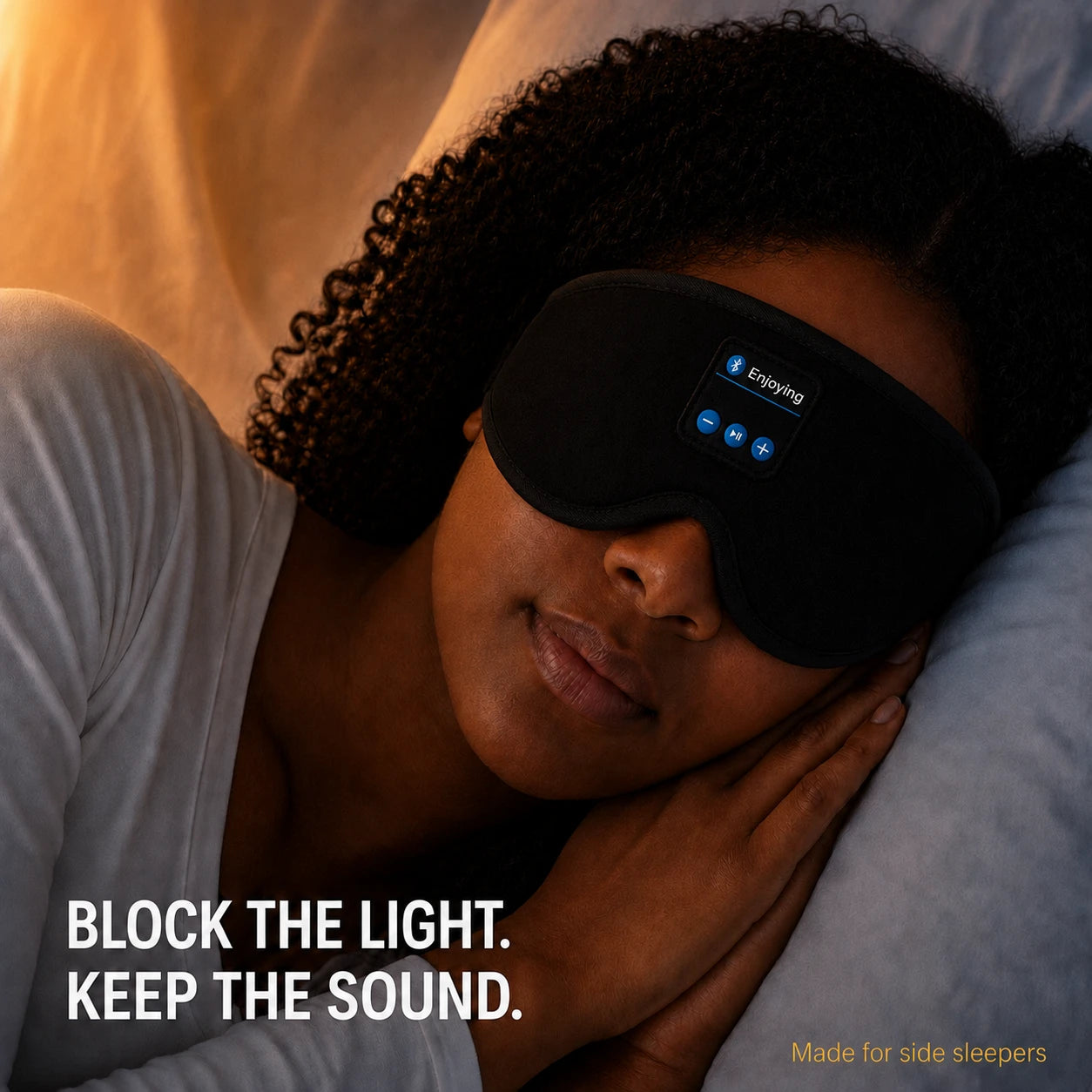 Woman sleeping on her side wearing the SleepSound Pro Bluetooth sleep mask - block the light, keep the sound